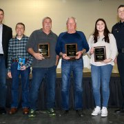 Jason Glick and Police Chief Darrel Smith with Ray Fagundes, Joe Correia, Frank Bernhardt and Makenzie Taylor, all recognized for their volunteer work.